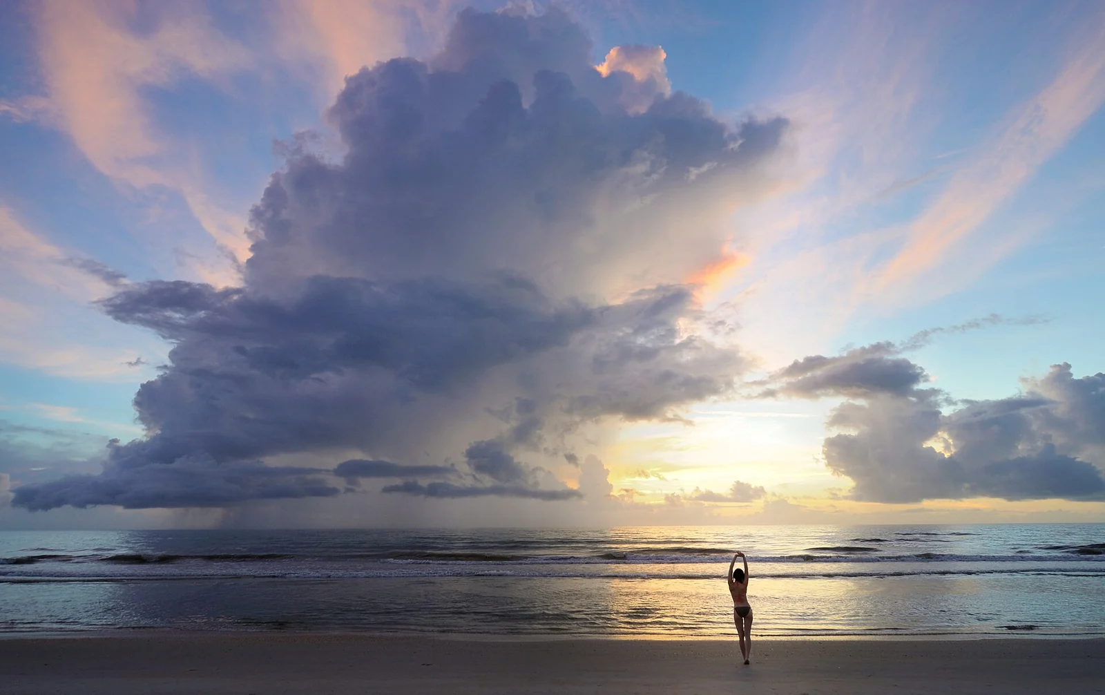 Sunrise clouds above the Atlantic shore at Canaveral National Seashore, photographed in 2014.